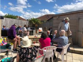 members sit and chat face to face for the first time for many months